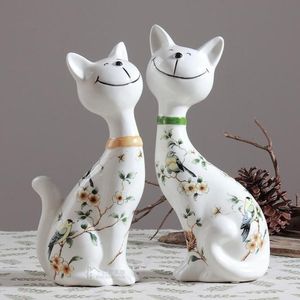 ヨーロッパファッションかわいいセラミックラッキーキャットホーム装飾工芸品部屋装飾オブジェクト笑顔猫像磁器動物の置物