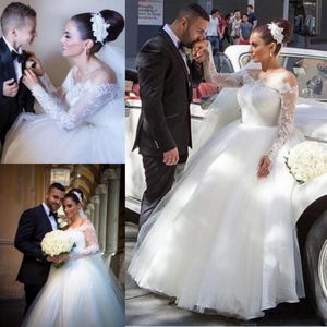 Off Shoulder Wedding Dresses Lace Sheer Long Sleeves Bridal Gowns Back Covered Buttons Tulle Ball Gown Wedding Vestidos 2019