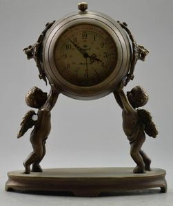 Orologio da tavolo meccanico da collezione con angelo bambino intagliato in ottone antico decorato