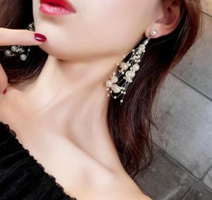 new Hot Europe and the United States long style pearl earrings nail female Japanese and Korean temperament fashion jewelry personality fashi