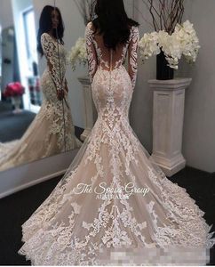 Abiti da sposa con maniche lunghe applicazioni di applique