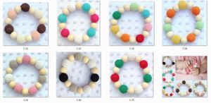 30pcs Baby Play Gym Chew Crochet Round Perline di legno Candy Ball Knit all'interno di legno Doccia Gift Bed Toys Neonato Massaggiagengive trottie sonagli YE017