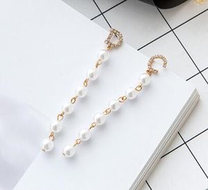 free shipping Long letter asymmetric set diamond pearl earring female version style banquet tassel earrings fashion classic exquisite