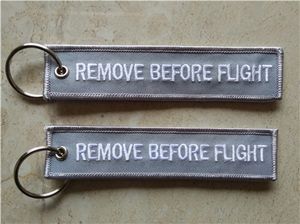 フライトを簡単に使用するキーチェーン荷物タグジッパープル編まれた刺繍キーチェーン13x2.8cm 100ピースロット