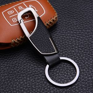 Ny Mode Högkvalitativ Mens Real Leather Car Keychain Ring Design Presentmetall Nyckel Kedja Till Salu