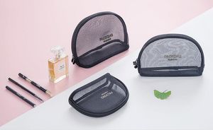 Borsa cosmetica di grande capacità per la conservazione di cosmetici da viaggio portatile portatile in rete