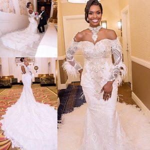 Koronki i Pióro Suknie Ślubne Sexy Off Shoulder Sheer Długie Rękawy Syrenki Suknie Ślubne Dubai Backless Court Train Wedding Vestidos