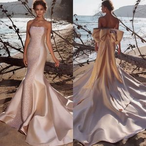 Charming Strapless Mermaid Evening Dresses Sexy Sleeveless Lace Applique Bow Back Prom Dresses Custom Made Celebrity Evening Party Gowns