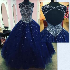 Abiti da ballo blu navy Abiti da sera Cristalli pieni di perline Top Abiti da spettacolo 2019 Modest Fashion Keyhole Occasione sexy Quinceanera Dress