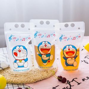 100 Pcs Cute Blue Cat Cartoon Colorful Plastic Drink Packaging Bag Pouch for Beverage Juice Milk Coffee,with Holes Handle 450ml