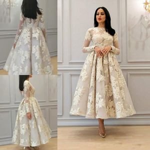 Illusion Neck African African Suknia ślubna z długimi rękawami koronkowe aplikacje Długość herbaty sukienki ślubne Saudyjskie arabskie suknie ślubne plus rozmiar