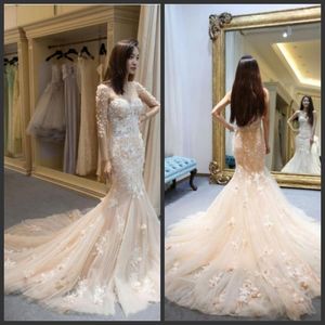 Champagne Pink Mermaid Wedding Dresses 3D Floral Appliques Jewel Sheer Neck Bridal Gowns Illusion Long Sleeves Wedding Gowns