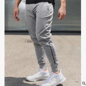 Nowy Trend Fitness Mężczyźni Joggers Spodenki List Wydrukowane Spodnie sportowe Jogger Spodnie Mężczyźni Dorywczo Spodnie Mężczyźni Gyms Kulturystyka Track Spodnie