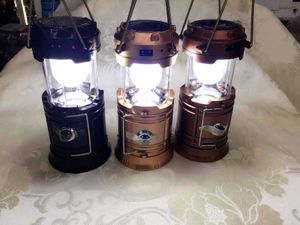 A versão de atualização com lanterna de carregamento solar lanterna de acampamento lâmpada lanterna de pesca de noite direto da fábrica