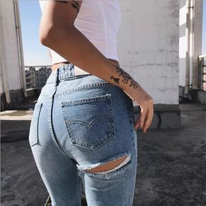 Kvinnor Buttom höft rippade nödställda jeans blyertsbyxor denim blå mager smala fit byxor kvinnlig pant sexig