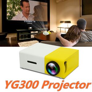 YG300 LED 휴대용 프로젝터 400-600LM 3.5mm의 오디오 320 X 240 픽셀 YG300 USB 미니 프로젝터 홈 미디어 플레이어 DHL 무료