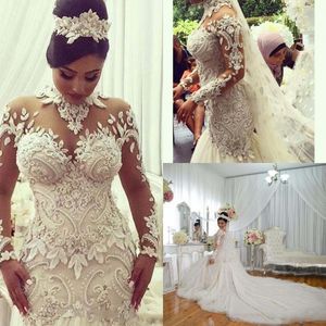 Retro spets sjöjungfru bröllopsklänningar Sheer Long Sleeves 3D-Floral Appliques Beaded Bridal Gowns Saudiarabien Sweep Train Wedding Vestidos