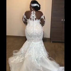 Amazing African Mermaid Bröllopsklänningar Lyxig pärlstav LACE-applikationer Långärmade brudklänningar Sexig Sheer Scoop Plus Size Bröllopsklänningar