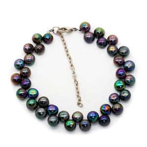Commercio all'ingrosso femminile dei monili di fascino della perla di forma piana nera del braccialetto 6-7mm della perla d'acqua dolce naturale di nuovo disegno di modo