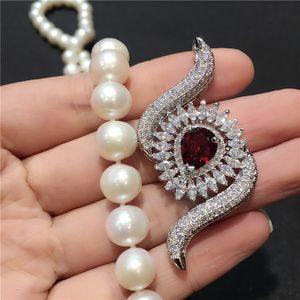 Micro chiusura in zircone di alta qualità intarsio bellissimi occhi fibbia nappa pendente moda maglia lunga catena maglione