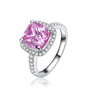 ファインピンク1ct Haloスタイルの婚約リング合成ダイヤモンドの女性925スターリングシルバージュエリープラチナメッキ結婚指輪