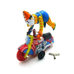 [Engraçado] Coleção para adultos Retro Acabar com o brinquedo Palhaço de lata de metal em um show de moroncycle acrobacias Clockwork toy figuras brinquedo vintage SH190913