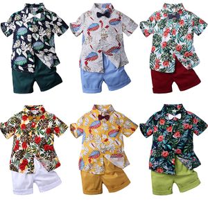 Set di abbigliamento per bambini Vestiti estivi per bambini Ragazzi Camicie con stampa floreale Top + Pantaloncini 2 pezzi / set Ragazzi Abiti Moda Abiti per bambini M1773