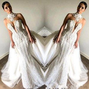 Sjöjungfrun överskjolar vintage klänningar nya höghals ärmlösa brudklänningar graciösa franska spetsar plus size bröllopsklänning