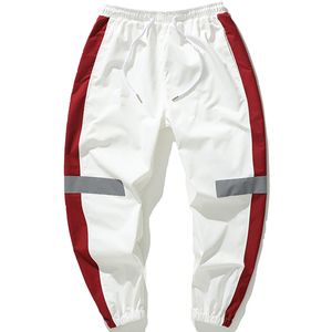 Mężczyźni Spodnie dresowe Luźne Mężczyźni Joggers Spodnie Hip Hop Sportswear Track Harem Spodnie Streetwear Spodnie 4XL 5XL