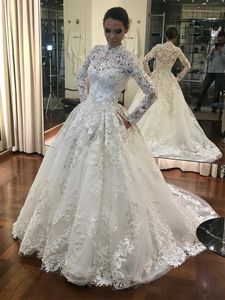 2020 Ny muslimska Kaftan A Line Bröllopsklänningar Hög Neckknapp Tillbaka Full Lace Applique Brudklänningar Långärmad Dubai Arabisk Bröllopsklänning