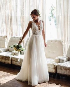 Sexy Cheap Bohemian Beach A Line Wedding Dresses V Neck Lace Appliques Tulle Illusion Open Back Long Plus Size Formal Bridal Gowns