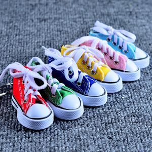 Mode Mini 3D Sneaker Schlüsselanhänger Segeltuchschuhe Schlüsselanhänger Tennisschuh Chucks Schlüsselanhänger Party Favors 7,5 * 7,5 * 3,5 cm Mischungsfarbe XD20893