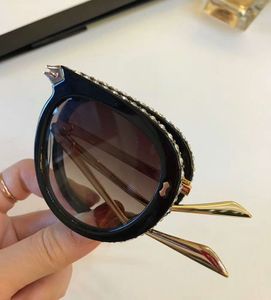 Kryształowe składane okulary przeciwsłoneczne dla kobiet mężczyzn luksus 0307 Złote czarne jasnoniebieskie okulary przeciwsłoneczne odcienie z Box221d