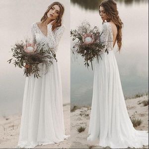 Tanie sukienki ślubne na plaży 2019 A-Line Szyfonowa Koronka Głęboka dekolt z długimi rękawami Backless Draped Bridal Suknia Gown Illusion