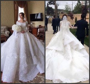 2020 Ball Gown Wedding Dresses Dubai Off The Shoulder Lace Tulle Applique Long Sleeve Wedding Gowns Sweep Train Sequins Vintage Bridal Dress