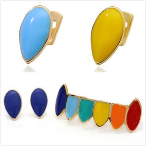 New 18K Gold Colorful Vampire Up Single Teeth Griglie Bottom Hip Hop Drip Fang Grillz Halloween Dental Tooth Cap Decorazione Gioielli in vendita