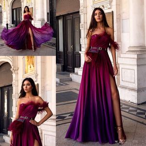 Oksana Mukha 2020 Evening Dresses Sexy Strapless High Side Split with Sashes Tassel A Line Satin Prom Dress Floor Length Formal Party Gowns