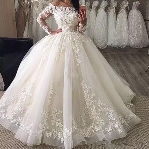 Primavera 2020 Grande abito da ballo gonfio Abiti da sposa con scollo a spalle scoperte Maniche lunghe trasparenti Bellissimi abiti da sposa in pizzo e tulle Personalizza