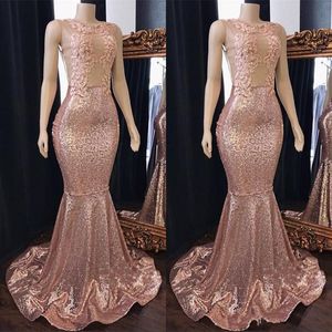 2019 Stunning Rose Gold Sequined Mermaid Prom Dresses Jewel Lace Appliques Illusion Ärmlös Sweep Train Formal Evening Wear Party Gowns