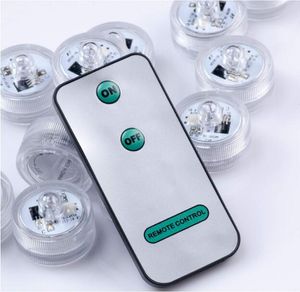 クリスマスのためのリモコン交換可能なコイン電池の水中防水ランプが付いているSXI ロット白色LED水中ティーライトキャンドル