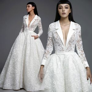 Special Design Lace Långärmade Chic Bröllop Bollklänningar Med Fickor Deep V Neck Custom Made Venice Lace Puffy Illusion Bridal Dress