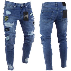 Män stretchiga jeans tecknad patch skinny jeans smal passform mode retro knä hål liten fot europeisk amerikansk stil ny