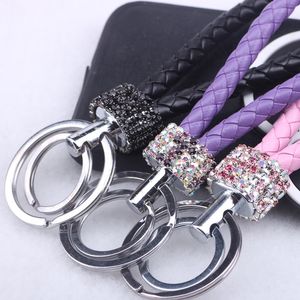 top popular Cheap! Double Loop Rhinestone Crystal keychain creative 2018 new key chains purse messenger bag backpack pendant 16 Colors 2022