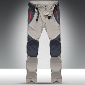 Pantaloni da uomo tattici impermeabili da uomo cargo primavera estate pantaloni ad asciugatura rapida sport all'aria aperta campeggio pesca 4XL