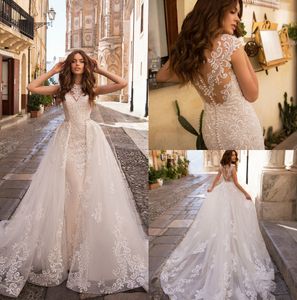 Lussanobridal Sirena Abiti da sposa con oversanzoni Abito da sposa in pizzo ad alto collo in pizzo ricoperto bottone retro senza maniche boho abito da sposa a buon mercato