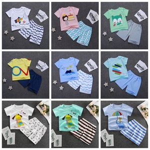 Baby Boy Одежда Set Cartoon ребёнка Рубашки Шорты 2pcs Набор с коротким рукавом малышей Эпикировки летом Детей Одежда 15 Дизайна DHW3329