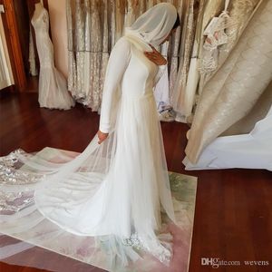 Muçulmano barato Um casamento linha de vestidos de Jewel Neck Long Sleeve Lace apliques em camadas de tule árabe Dubai vestido de noiva vestidos de noiva sob encomenda
