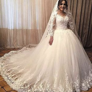 Puffy Ball Gown Wedding Dresses 2020 Sheer Jewel Neck Lace Appliques Illusion Long Sleeves Tulle Bridal Gowns Made to Order vestido de noiva