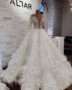 Luksusowe arabskie suknie ślubne z piórami koraliki cekiny klejnot szyja linia z długim rękawem suknie ślubne Sweep Pociąg Vestido de Novia