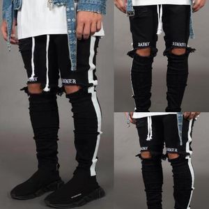 Jeans skinny strappati da uomo con fori per il ginocchio da uomo 2019 Pantaloni in denim a matita nera Pantaloni da jogging a righe laterali strappati di design